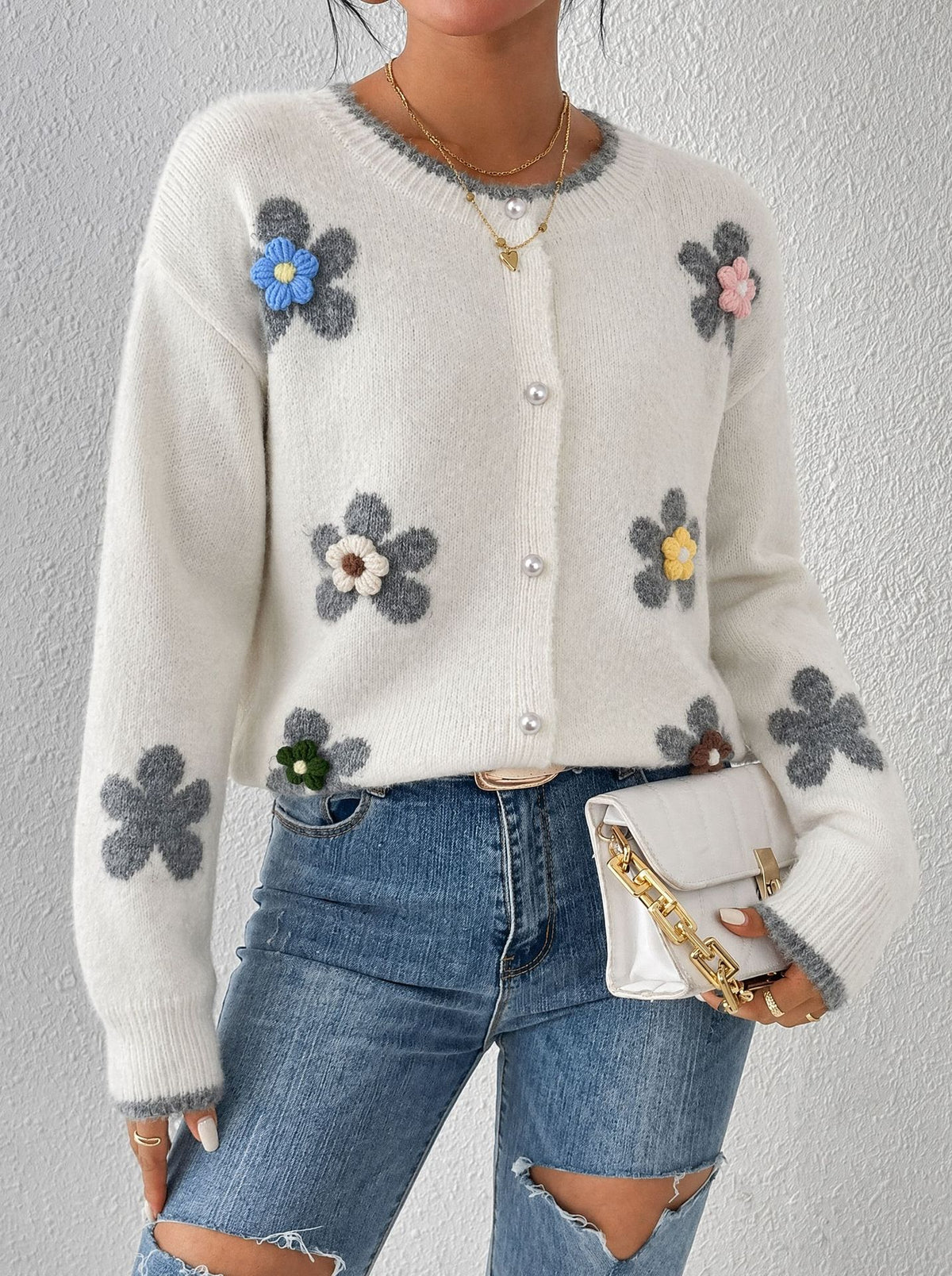 Stylish And Elegant Knit Cardigan With 3d Floral Appliqués.