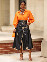 Trendy And Edgy Metallic Gold Grommets Pu Skirt