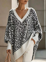 Cozy, Chic Knit Top With A Buttoned Stand Collar And Contrasting Stripes.