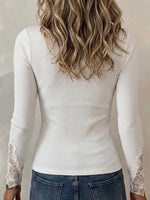 Long-sleeved Top Featuring Lace Trim And Rhinestone Embellishments At The Neckline And Cuffs
