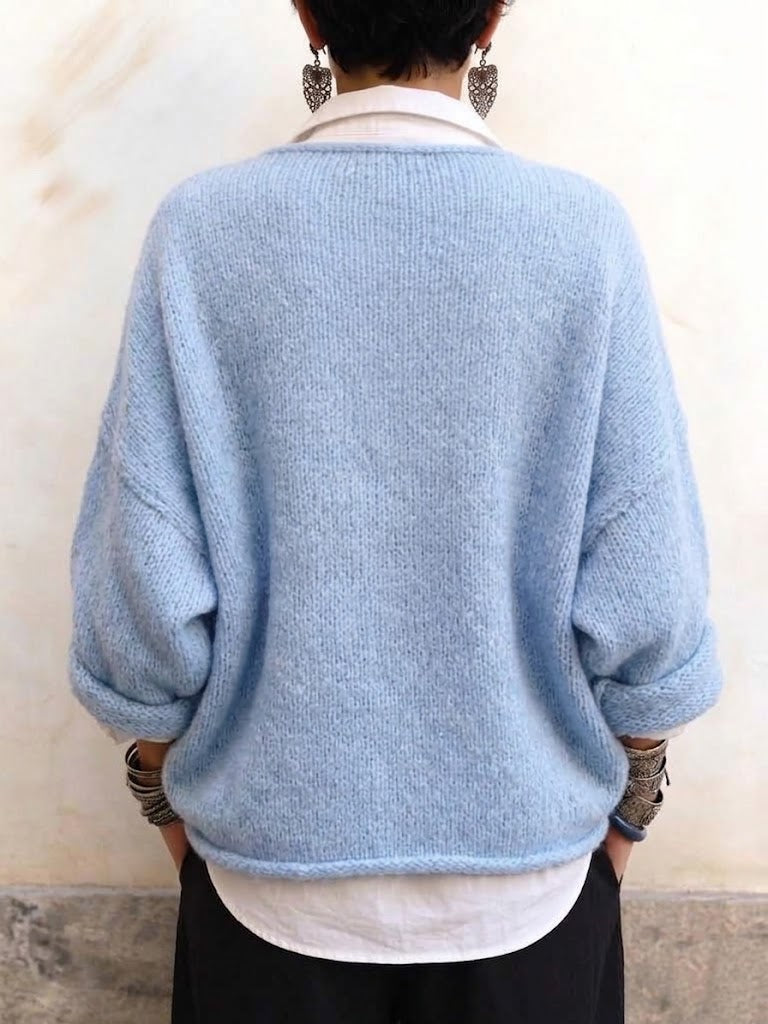 Cozy, Relaxed-fit Knit Top With A V-neck And Gathered Front Detail.