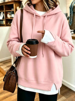 Casual White Hooded Sweatshirt With Color-block Detailing And A Layered-look Design.