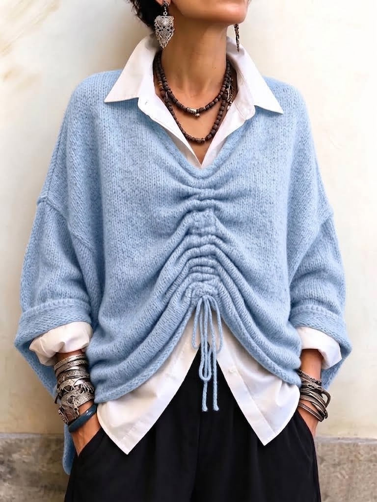 Cozy, Relaxed-fit Knit Top With A V-neck And Gathered Front Detail.