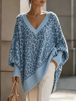 Cozy, Chic Knit Top With A Buttoned Stand Collar And Contrasting Stripes.