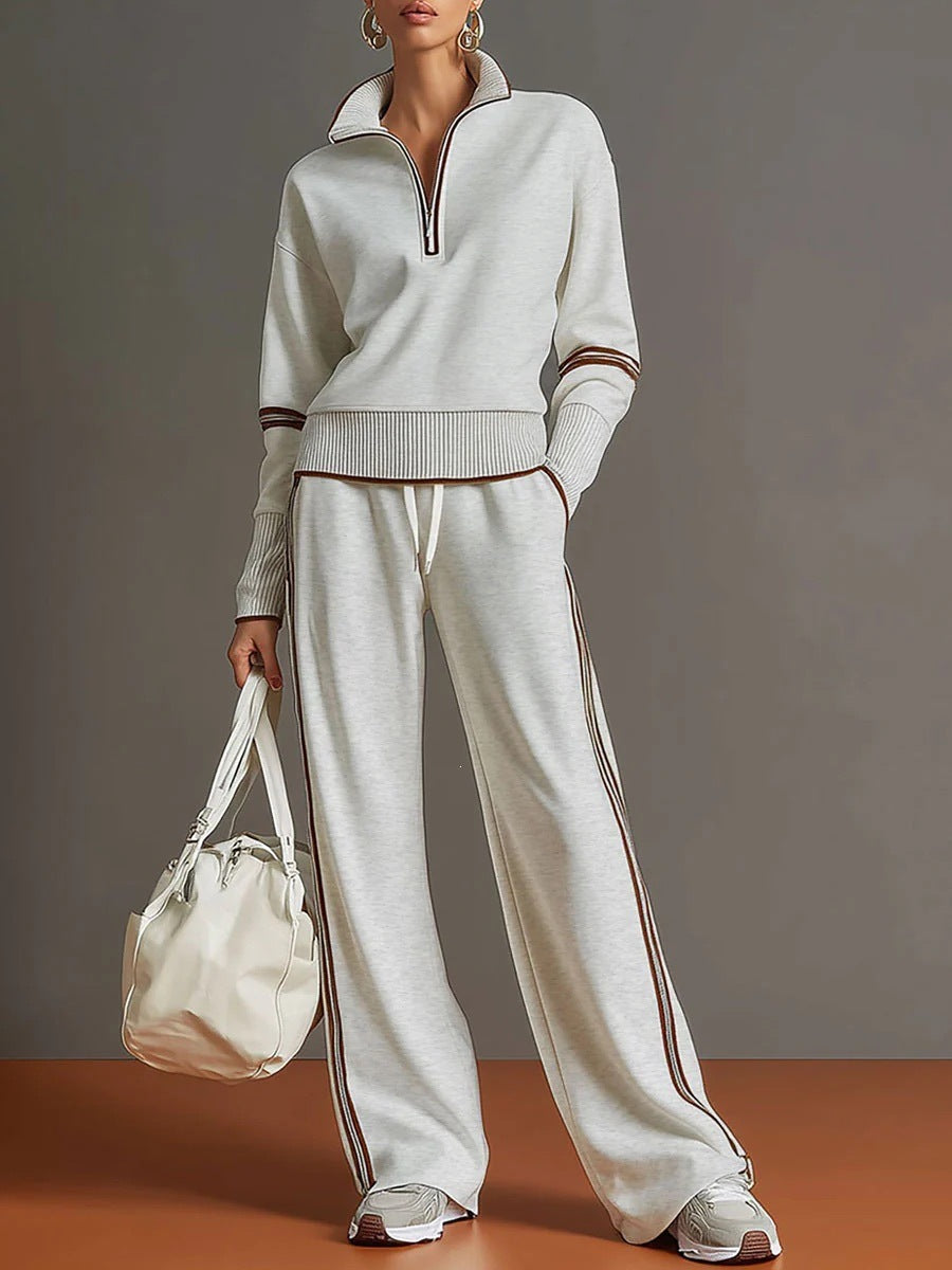 Casual Two-piece Set Featuring A Half-zip Cotton Sweatshirt And Pants With Color-block Piping.