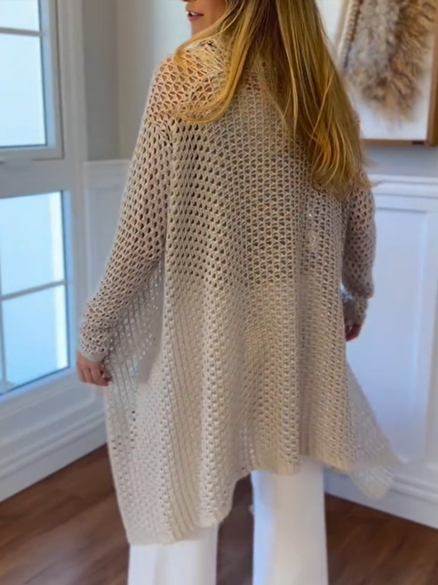 Chic Long-line Knit Sweater With A Stacked Collar And Cut-out Detailing.