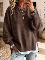 Loose-fit Knit Sweater With A Round Neck, Lantern Sleeves, And Side Slits