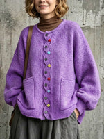 Loose-fit, Drop-shoulder Knit Cardigan Featuring A Wavy Placket, Decorative Colorful Buttons, And Large Patch Pockets