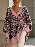 Cozy, Chic Knit Top With A Buttoned Stand Collar And Contrasting Stripes.